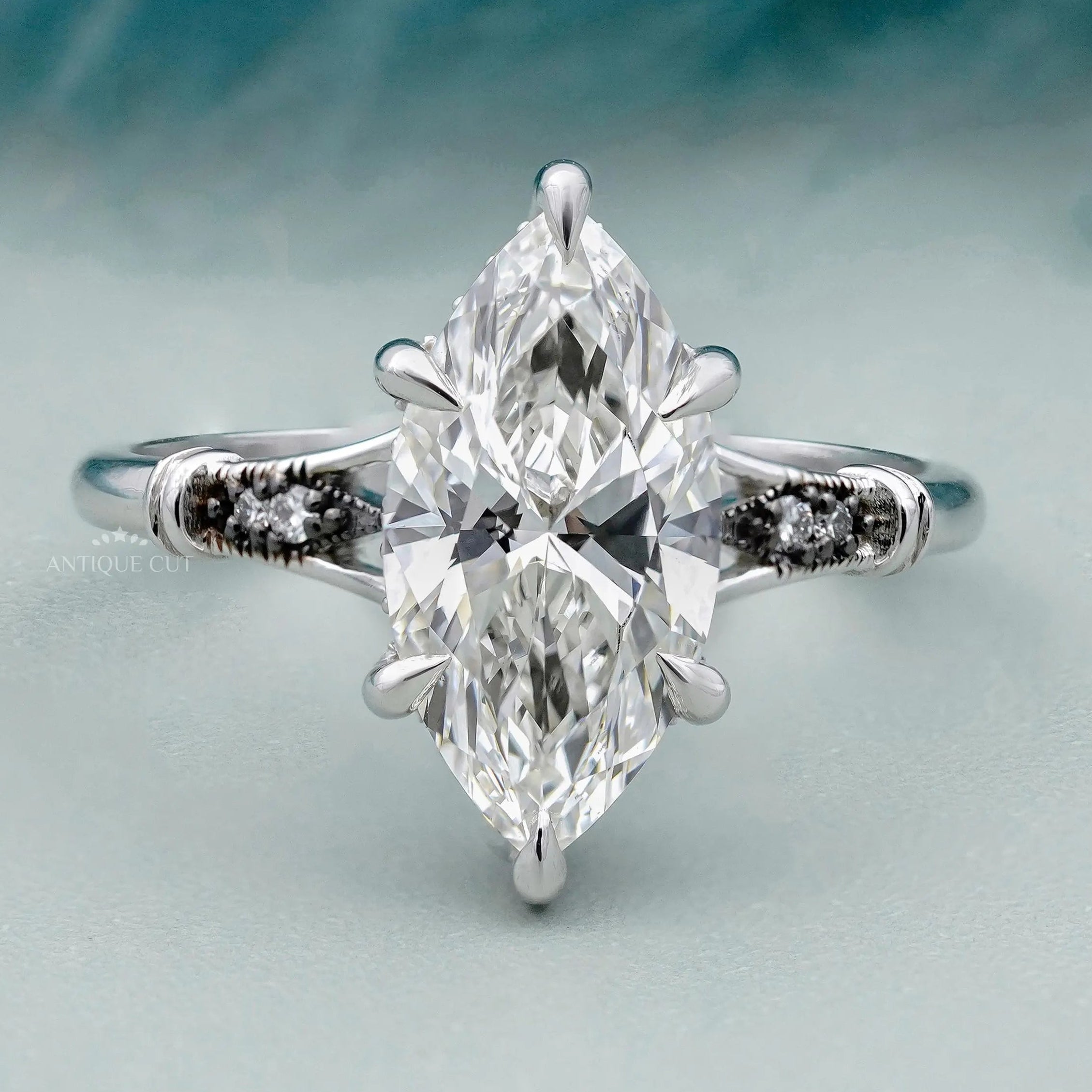 marquise engagement ring with hidden halo