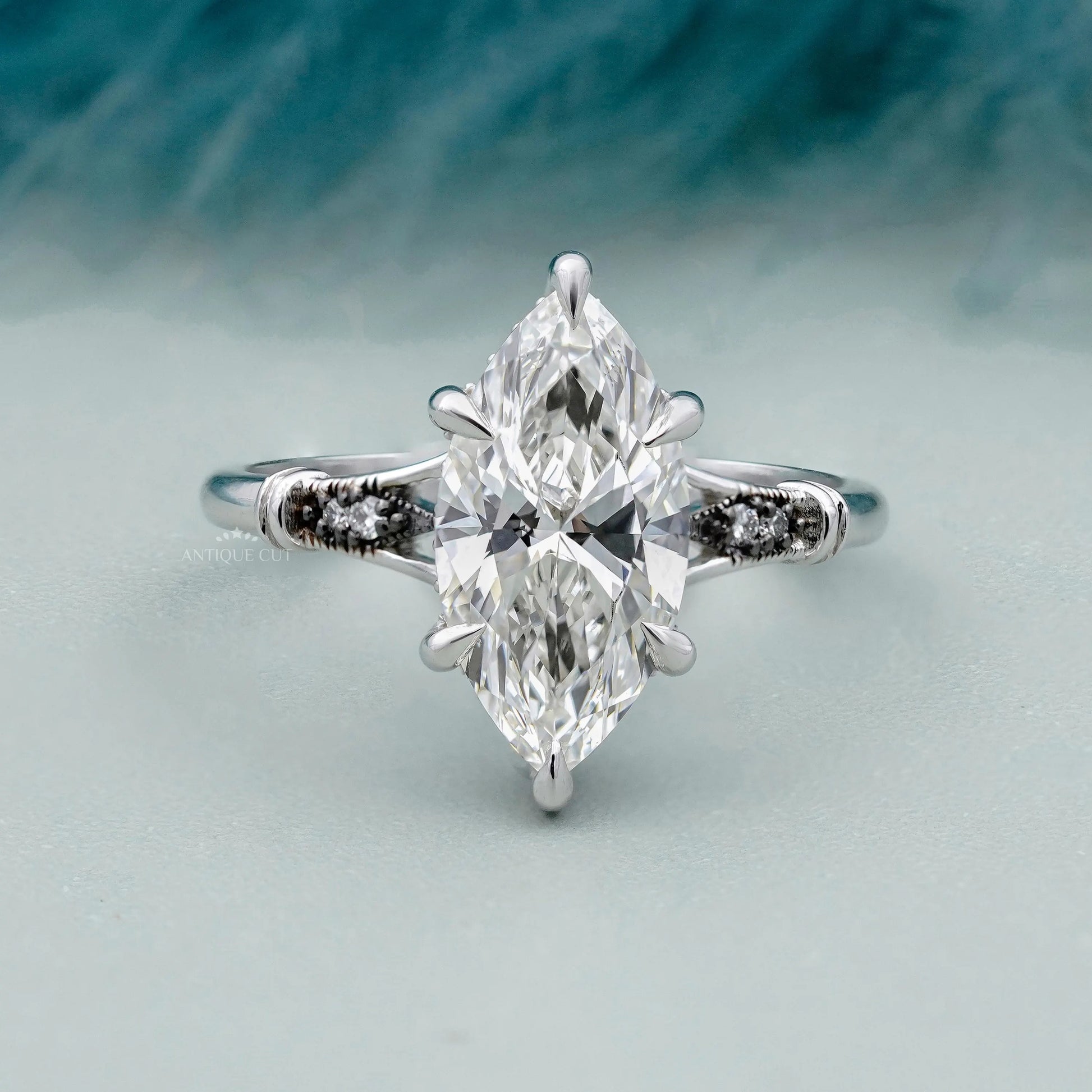 marquise engagement ring with hidden halo