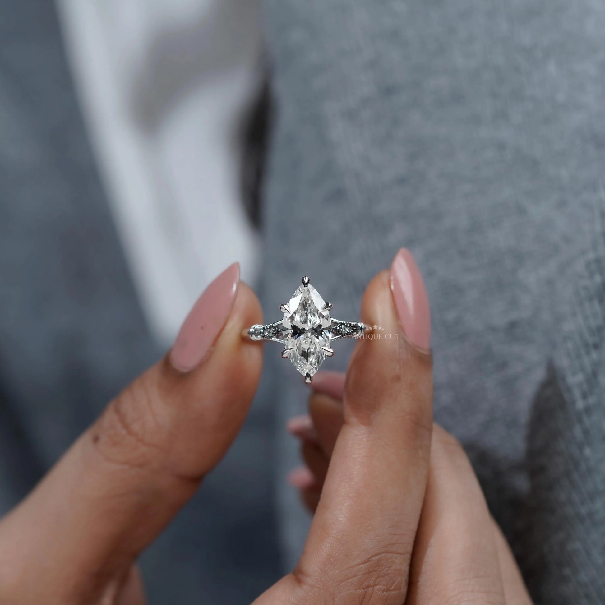 Vintage marquise engagement ring with hidden halo