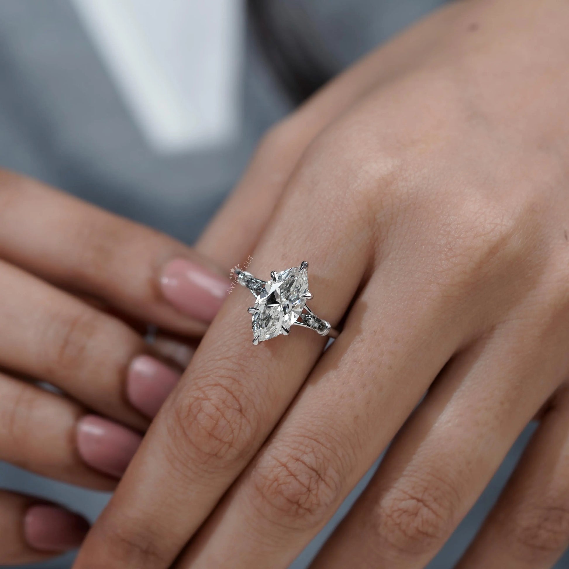 Vintage marquise engagement ring with hidden halo