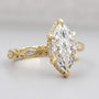 Vintage marquise diamond engagement ring with hidden halo