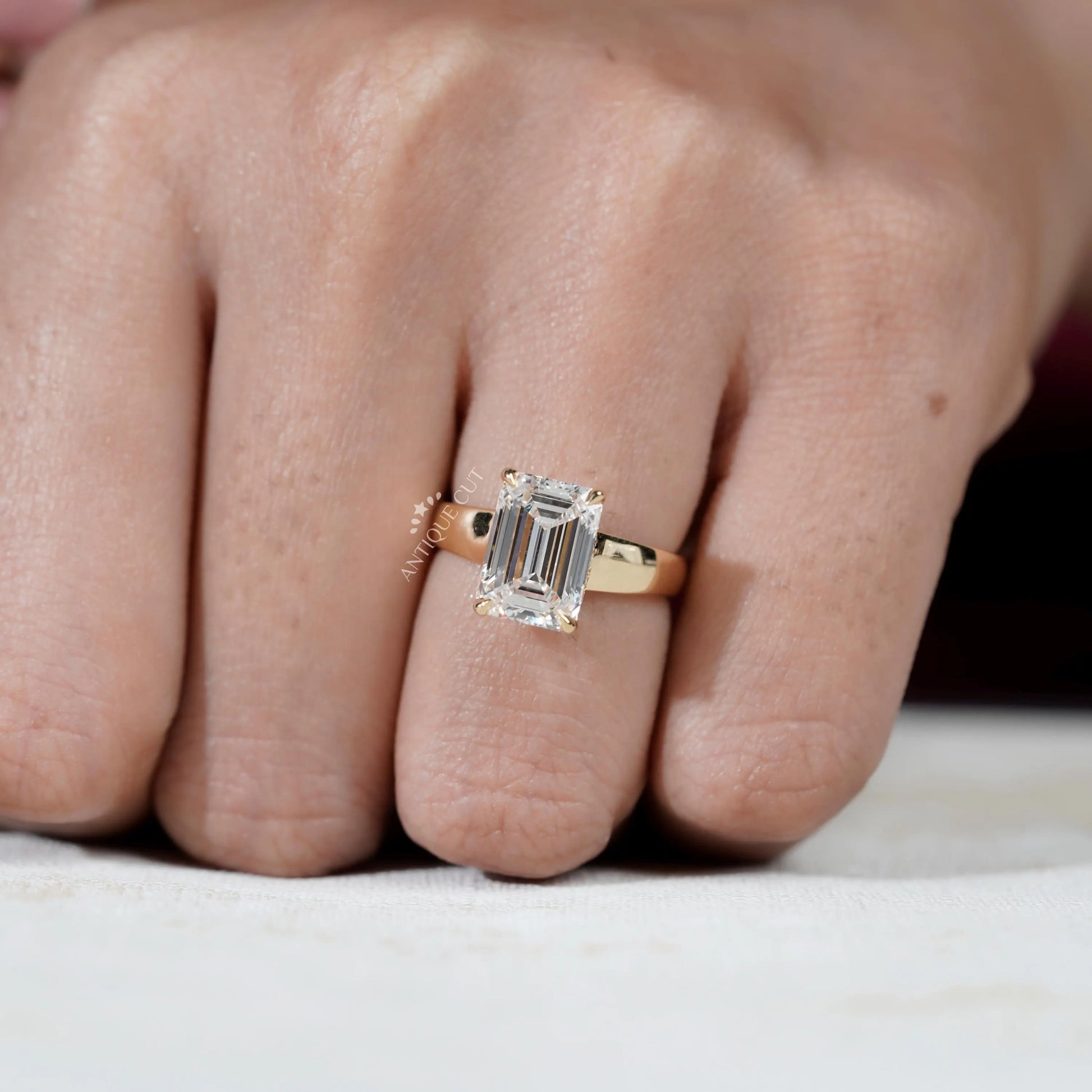IGI certified emerald cut diamond ring