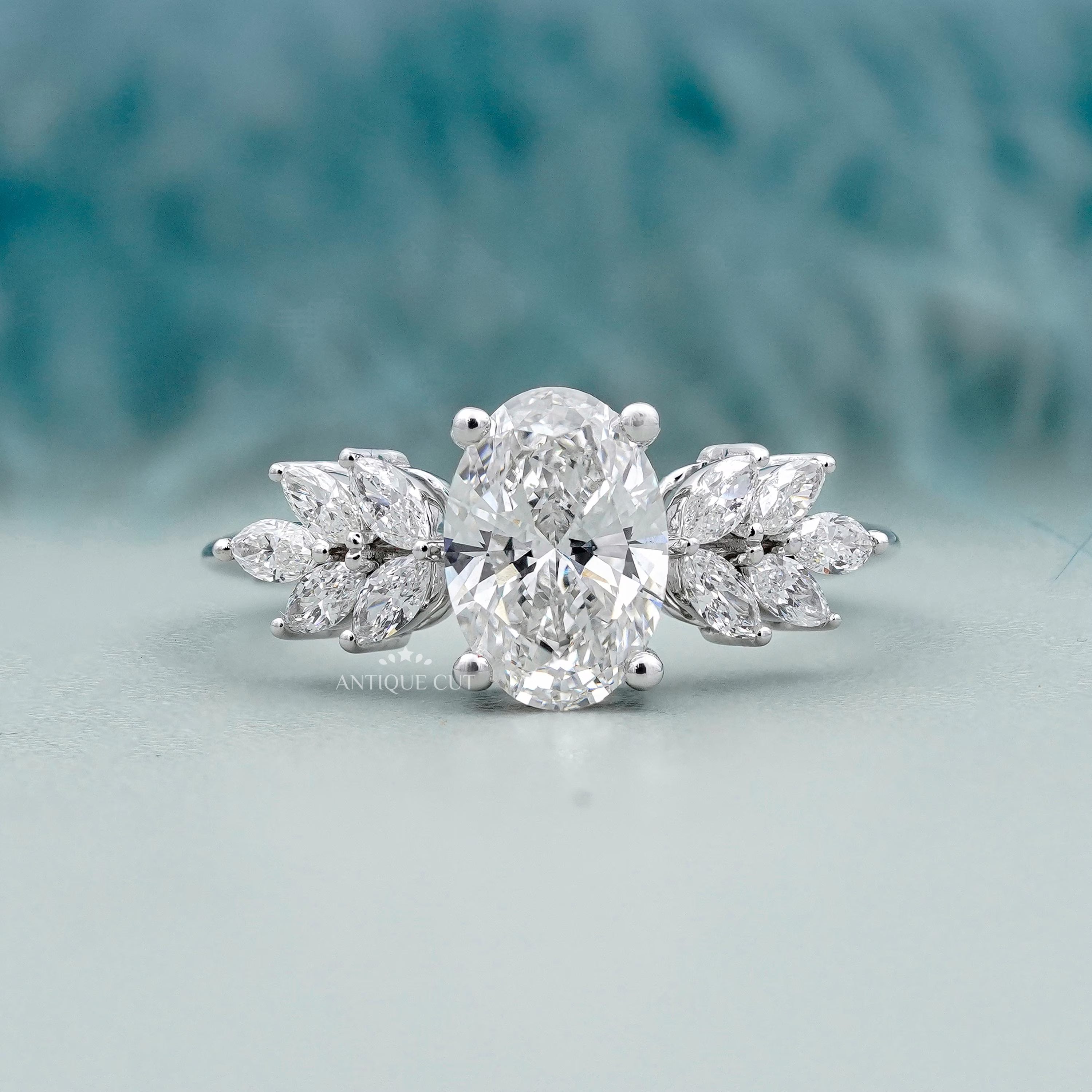 Oval Cut Diamond Engagement Ring | Marquise Side Stones | Prong Set 
