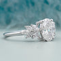 Oval lab grown diamond ring with marquise accents