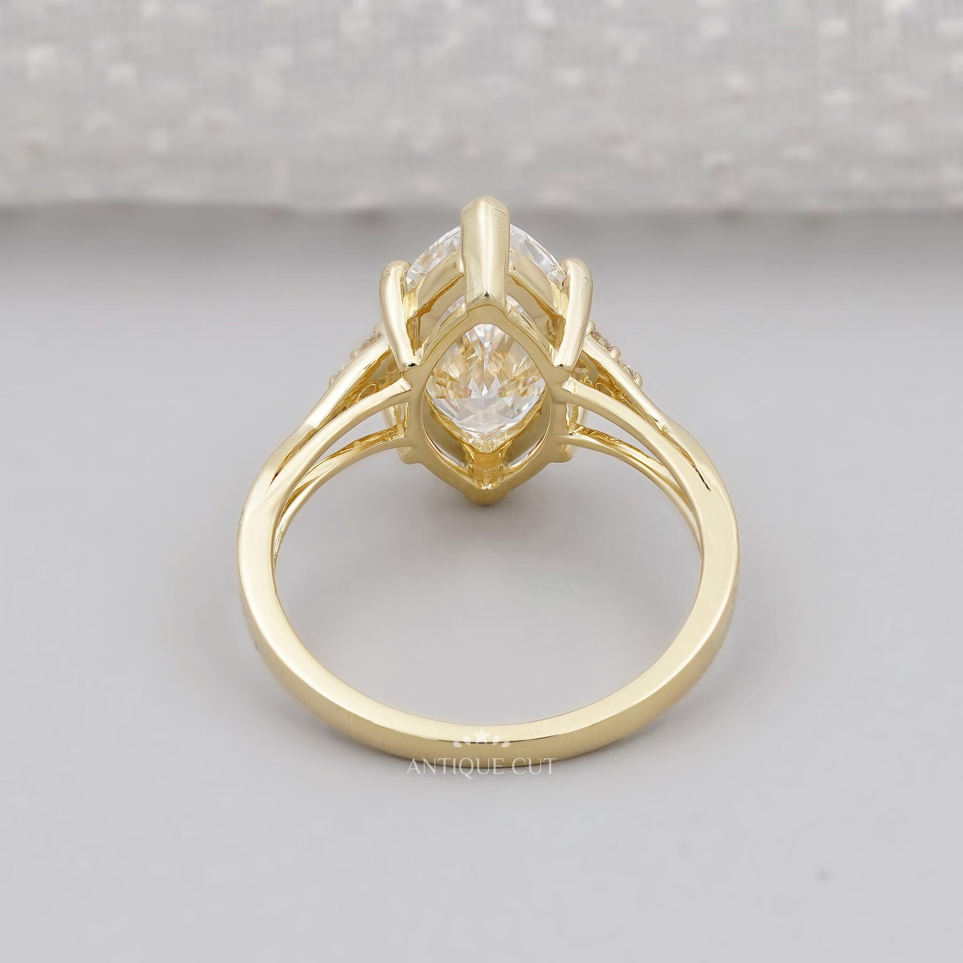 Lab grown marquise diamond engagement ring with side stones