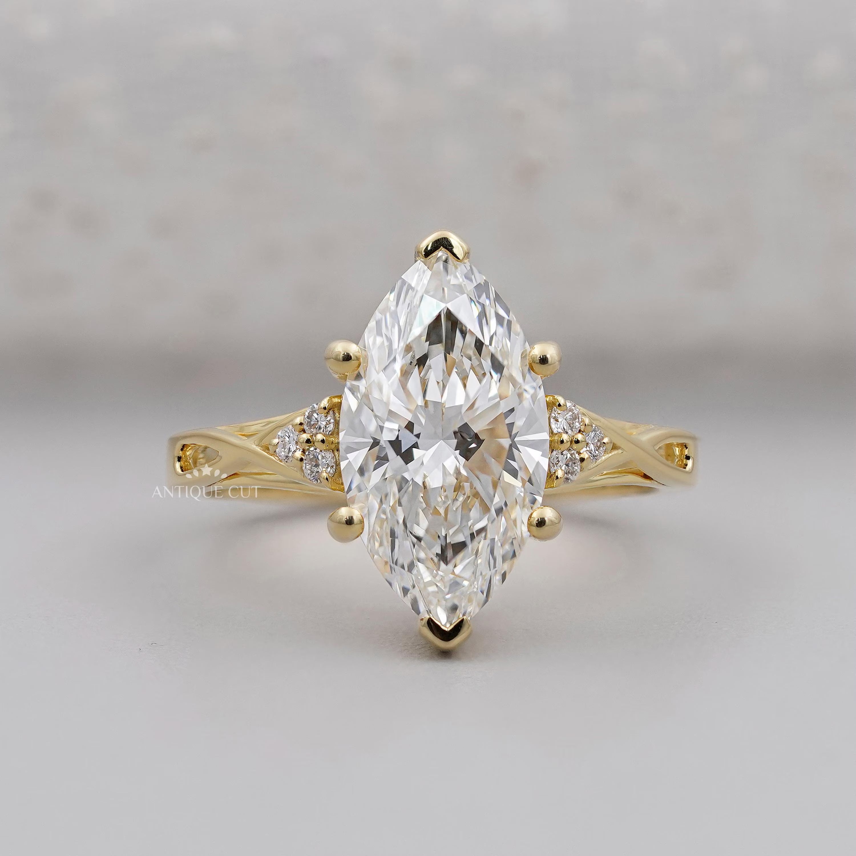 Marquise Cut Diamond Engagement Ring | with Round Side Diamonds
