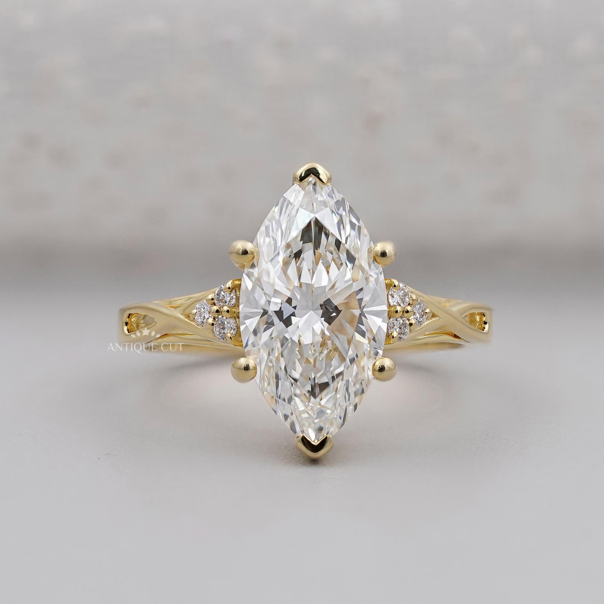 Marquise Cut Diamond Engagement Ring | with Round Side Diamonds