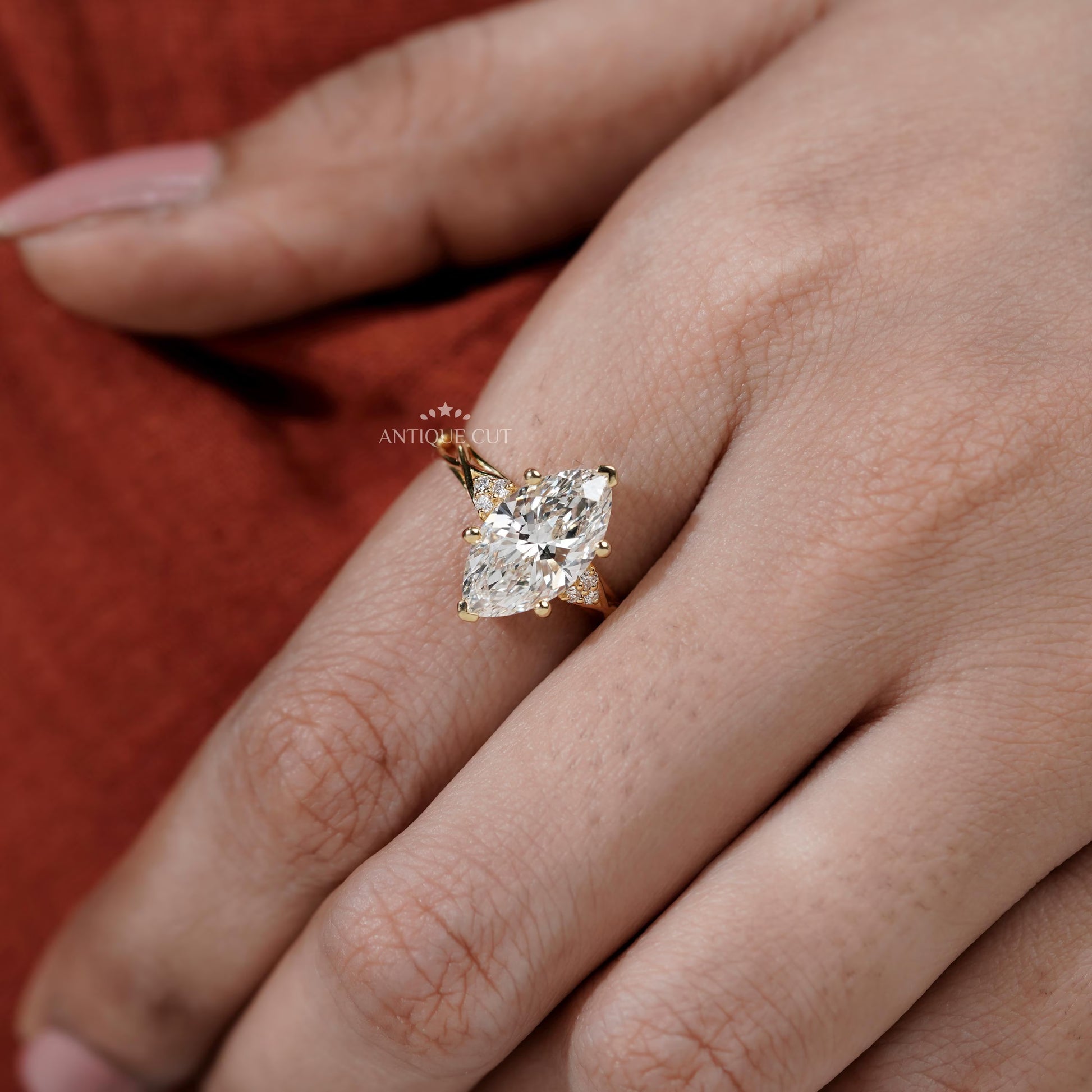 Marquise Engagement Ring With Round Diamond With Side Stones | IGI Certified