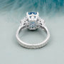 Vintage inspired cushion cut blue diamond bridal ring