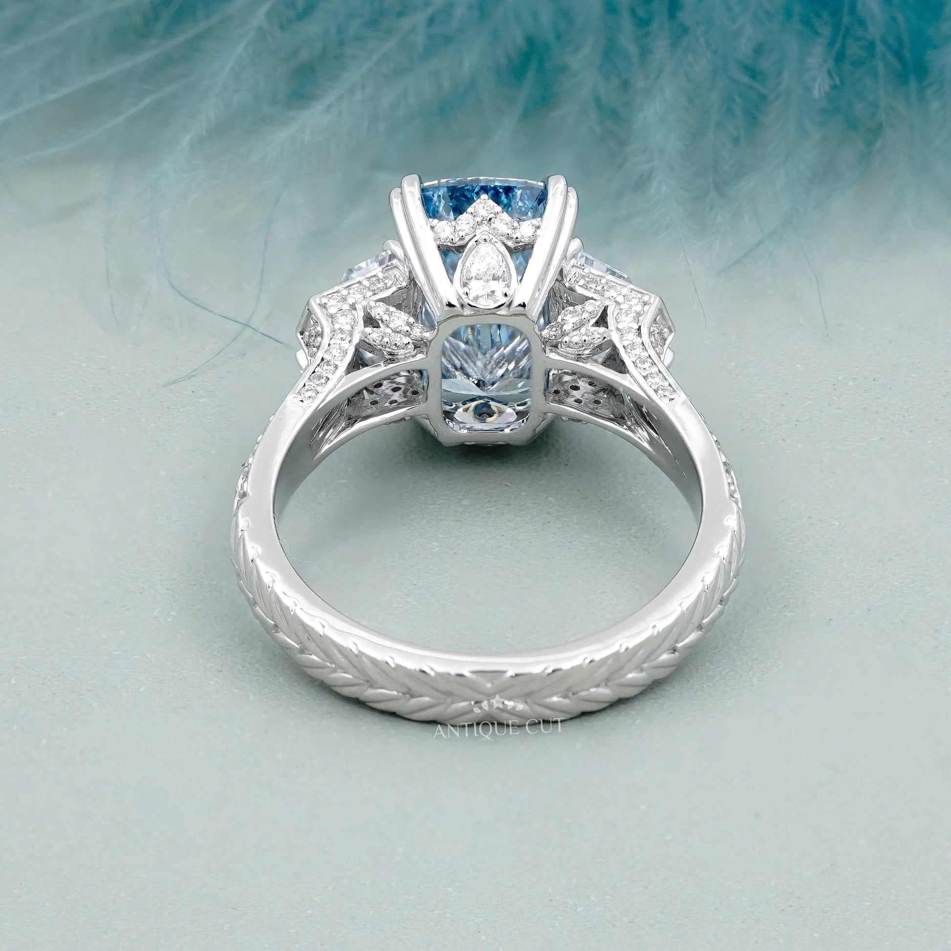 Vintage inspired cushion cut blue diamond bridal ring