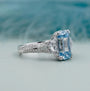 Cushion cut fancy blue diamond engagement ring with double prong setting