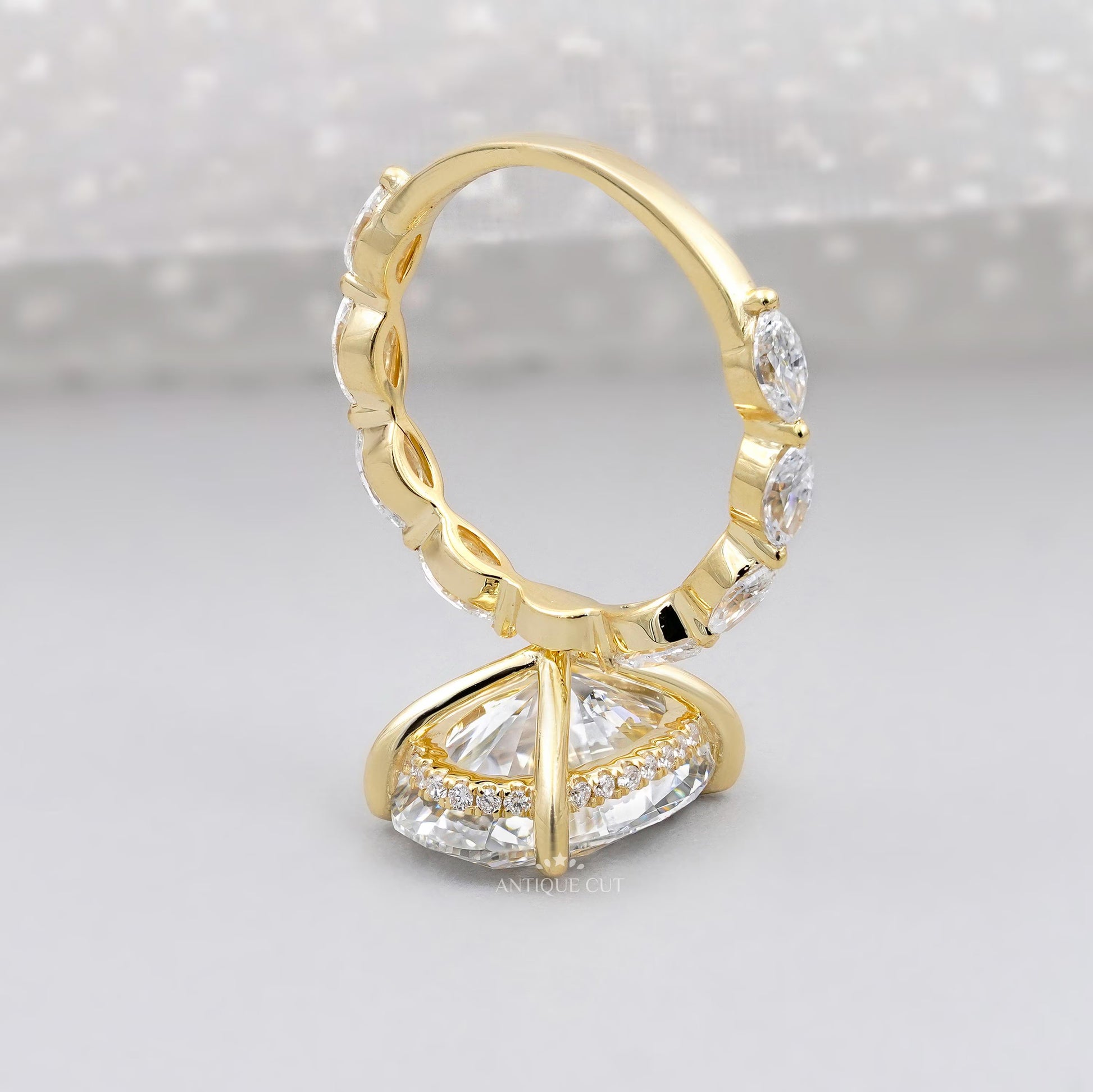 Oval Cut Diamond Engagement Ring with Hidden Halo & Marquise Side Stones