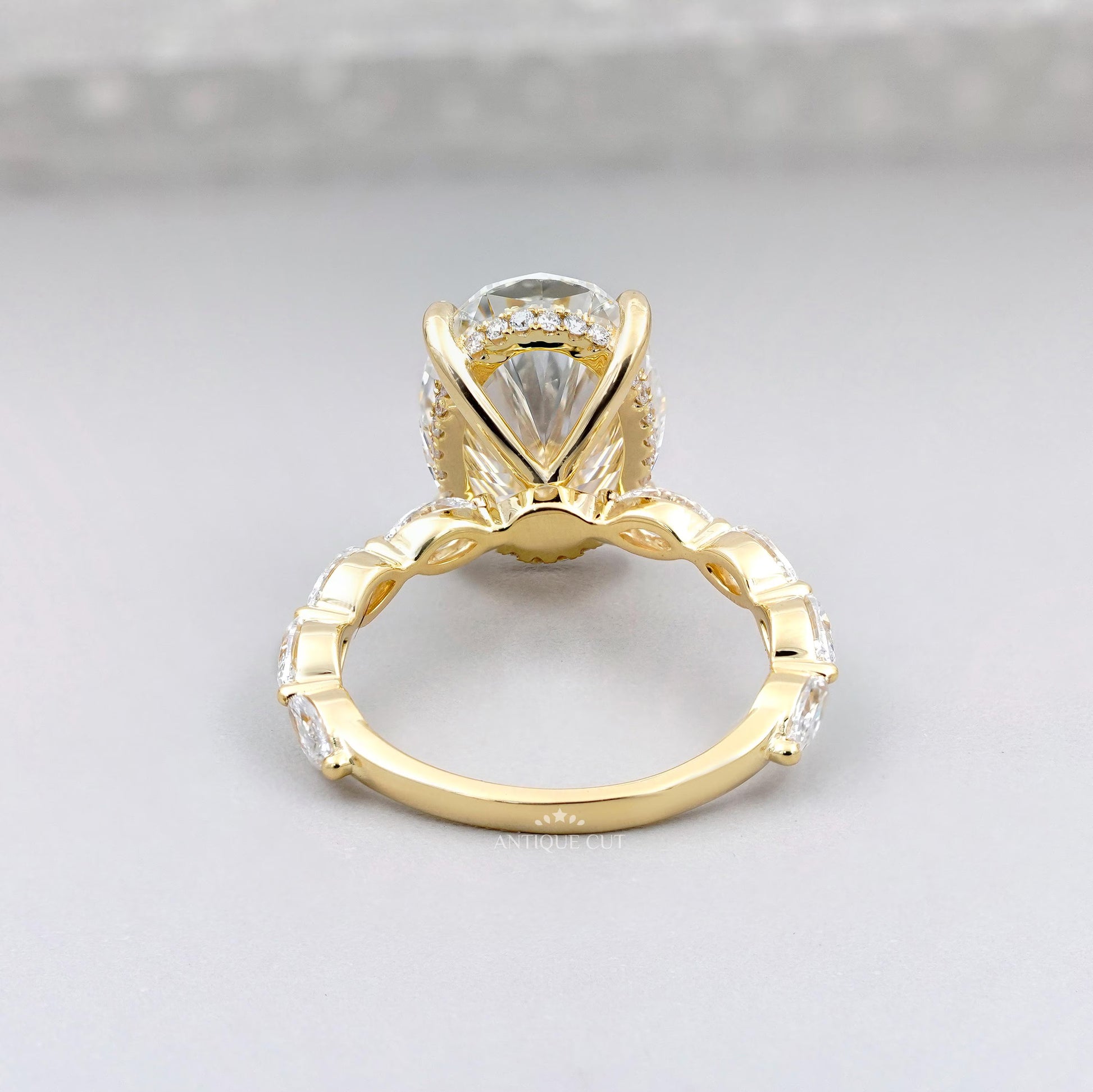 Oval Cut Diamond Engagement Ring with Hidden Halo & Marquise Side Stones