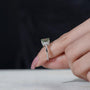 Elegant emerald cut light green diamond ring white gold