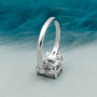 4 prong emerald cut light green diamond ring