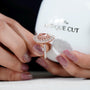 Lab grown pear pink diamond engagement ring with halo