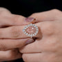 Timeless rose gold cluster halo pink pear diamond ring