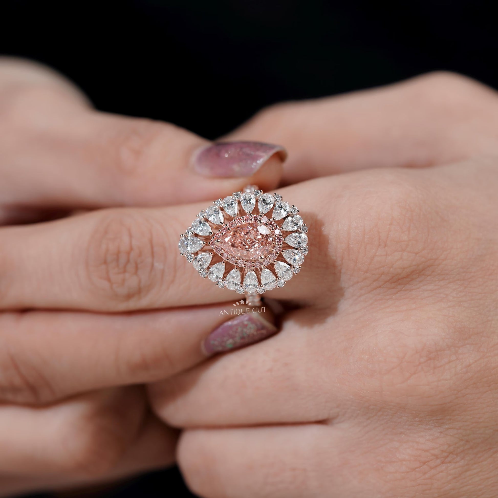 Timeless rose gold cluster halo pink pear diamond ring