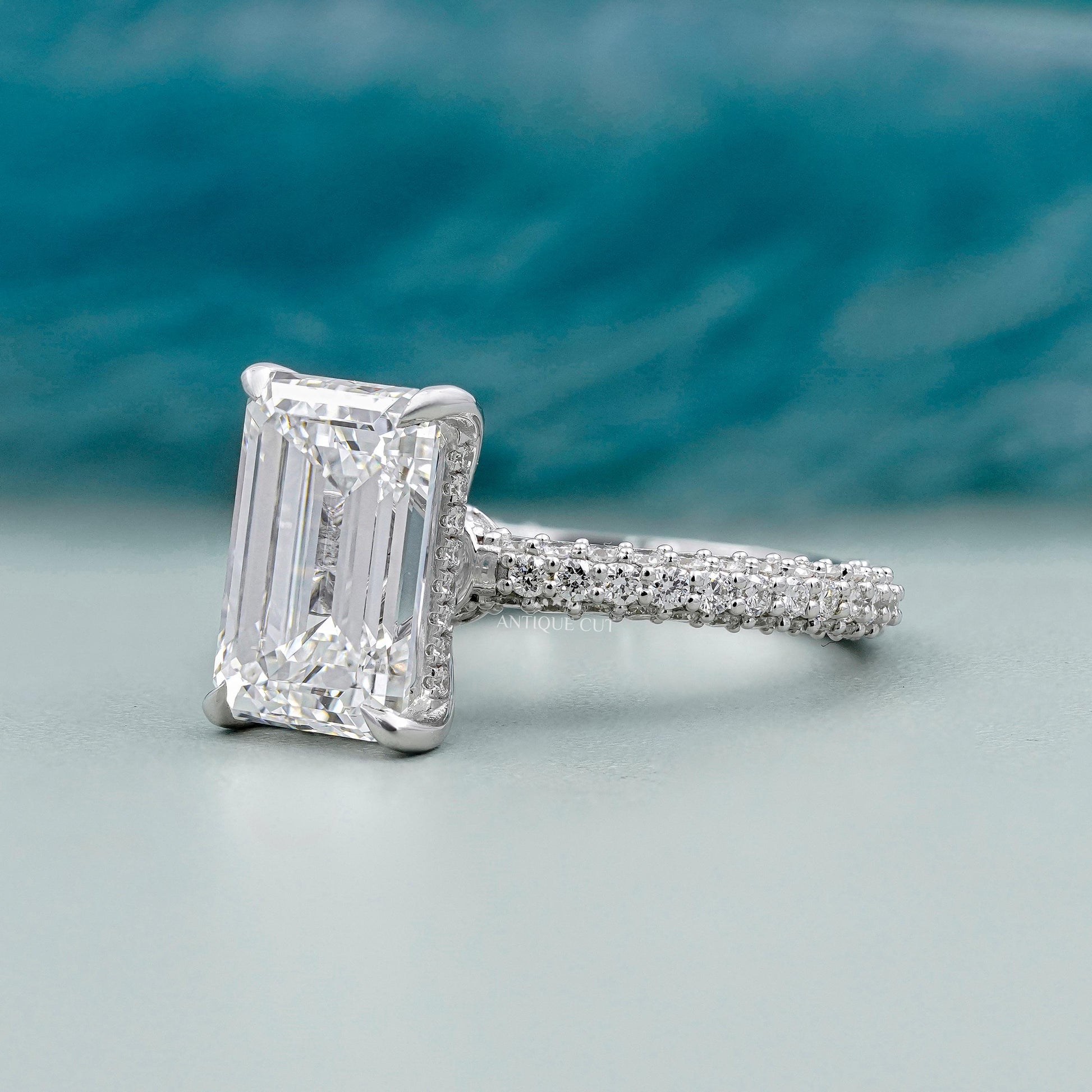 Hidden halo lab grown diamond ring emerald cut center diamond
