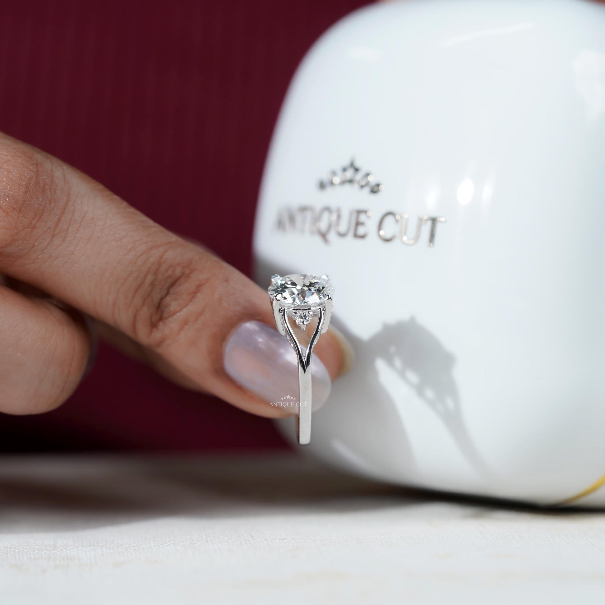 Modern round cut diamond engagement ring