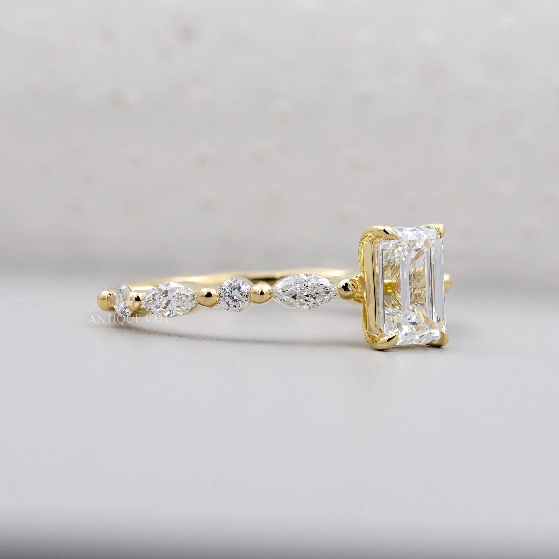 IGI certified emerald cut diamond ring yellow gold