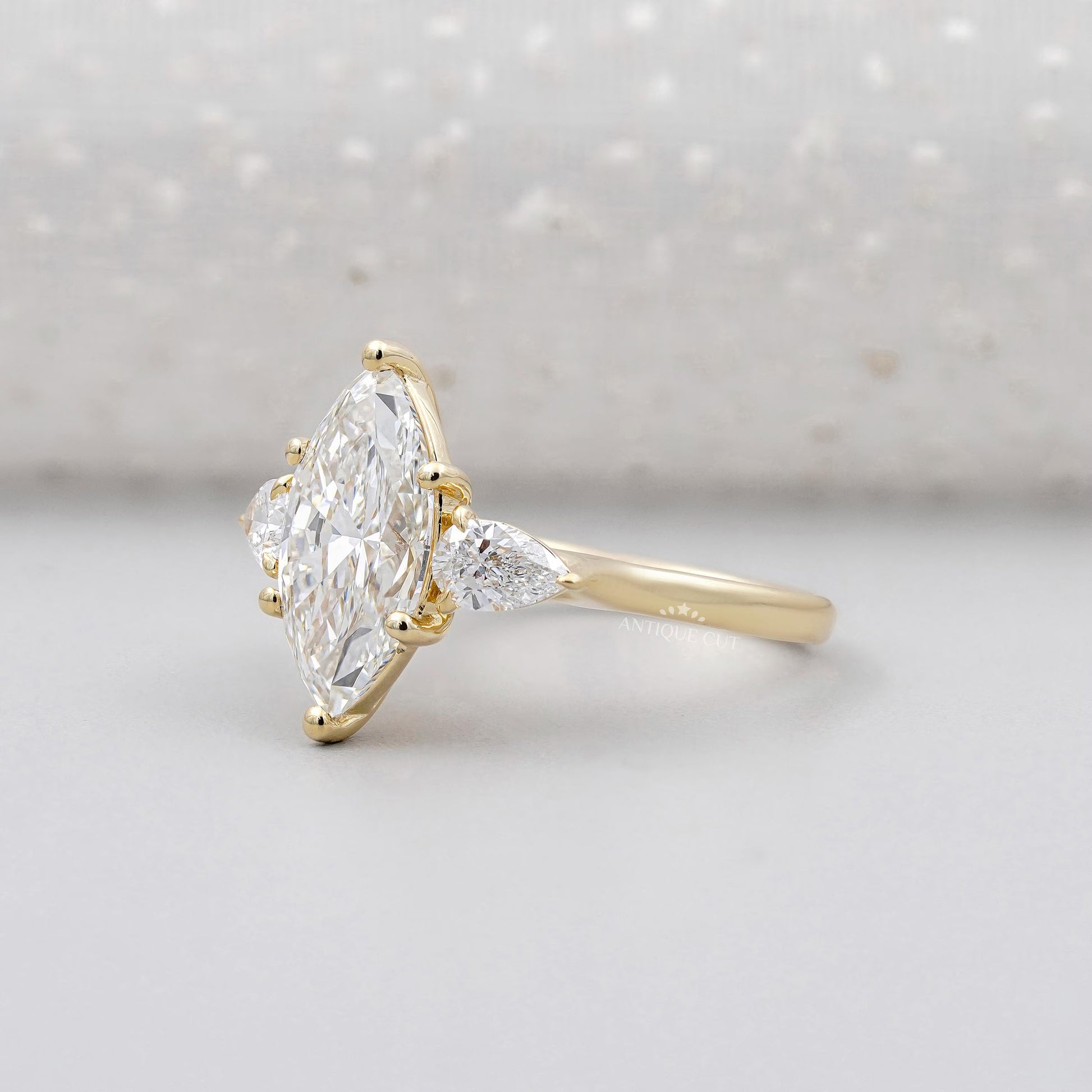 Lab grown marquise cut engagement ring three stone