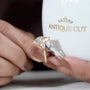 Brilliant marquise diamond ring with side stones