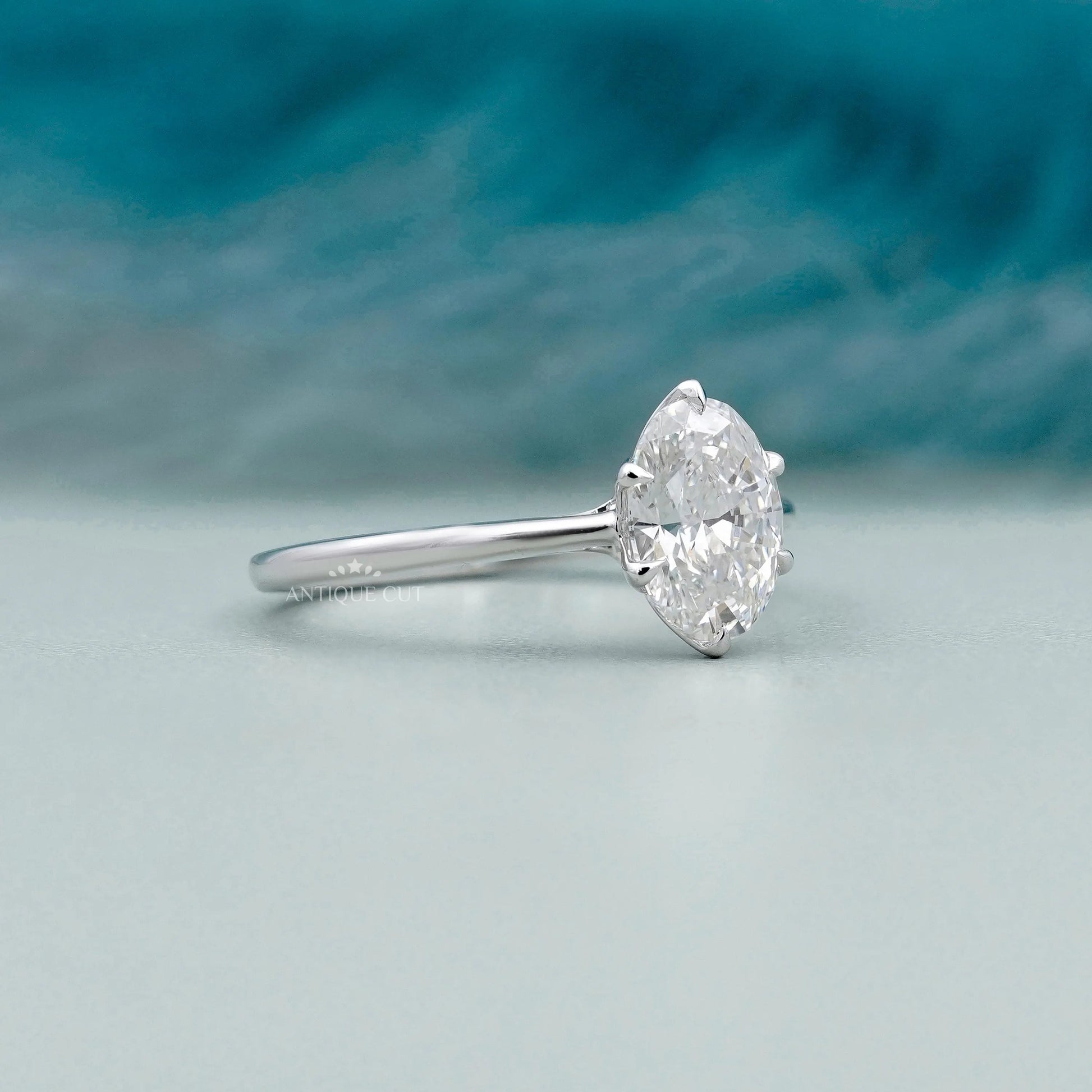 White gold oval diamond ring with 6 prong setting