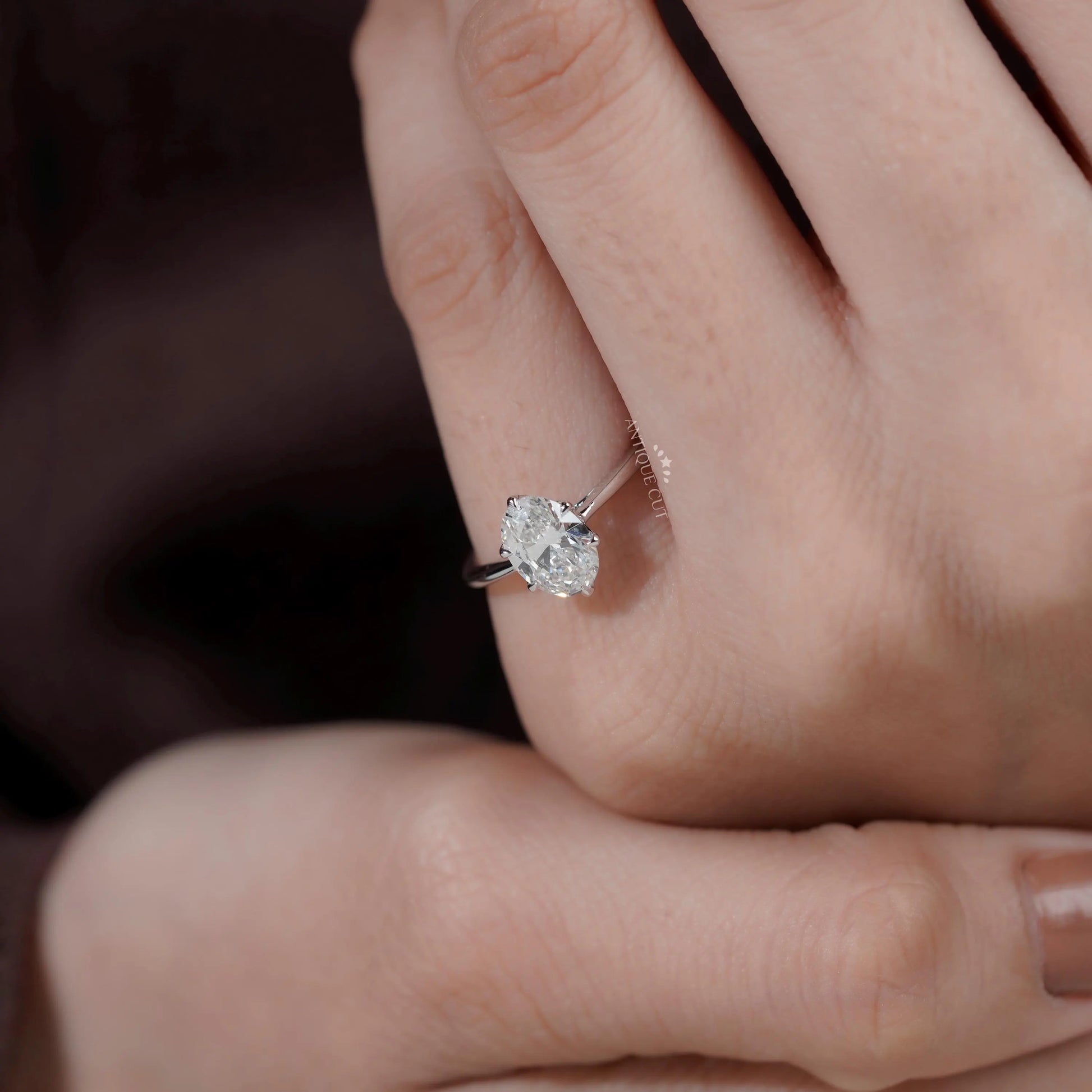 Antiquecut oval solitaire engagement ring
