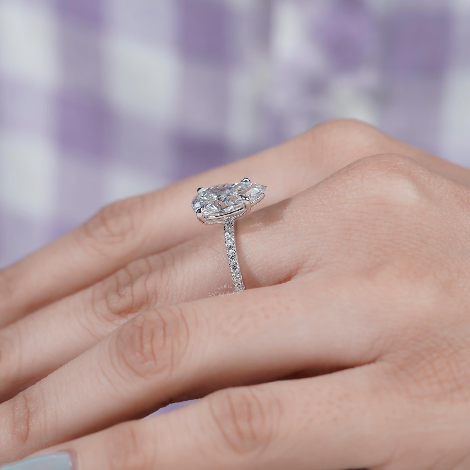Luxury pear shaped engagement ring white gold