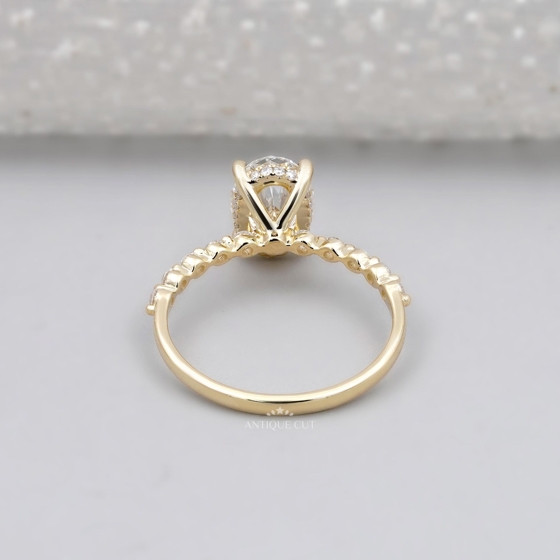 Oval cut diamond ring with hidden halo close-up