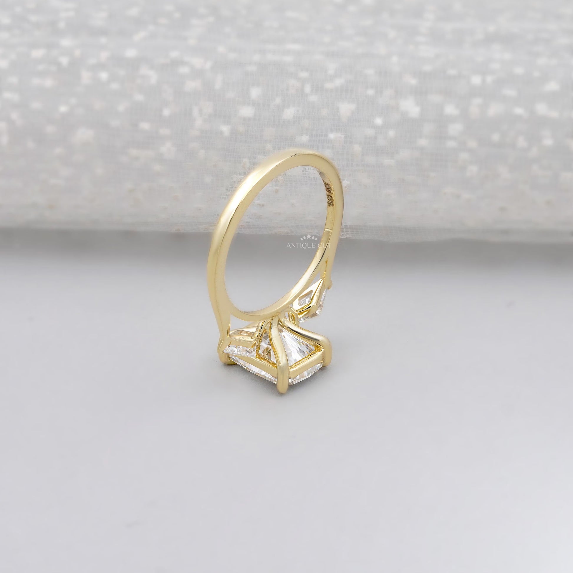Cushion cut diamond ring with 4 prong setting