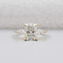 Yellow gold cushion cut diamond ring with kite side stones