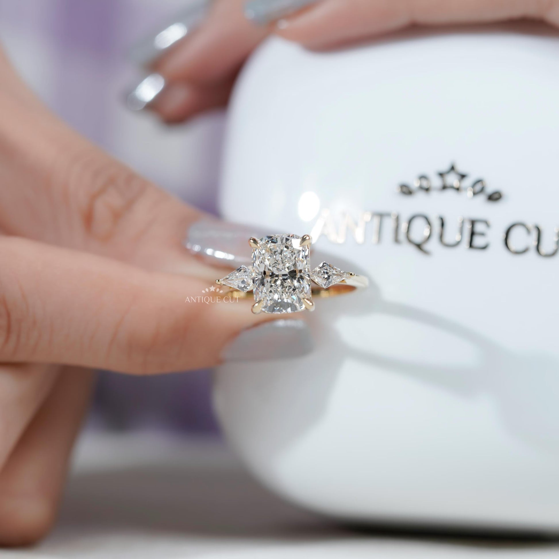 Unique kite side stone diamond ring