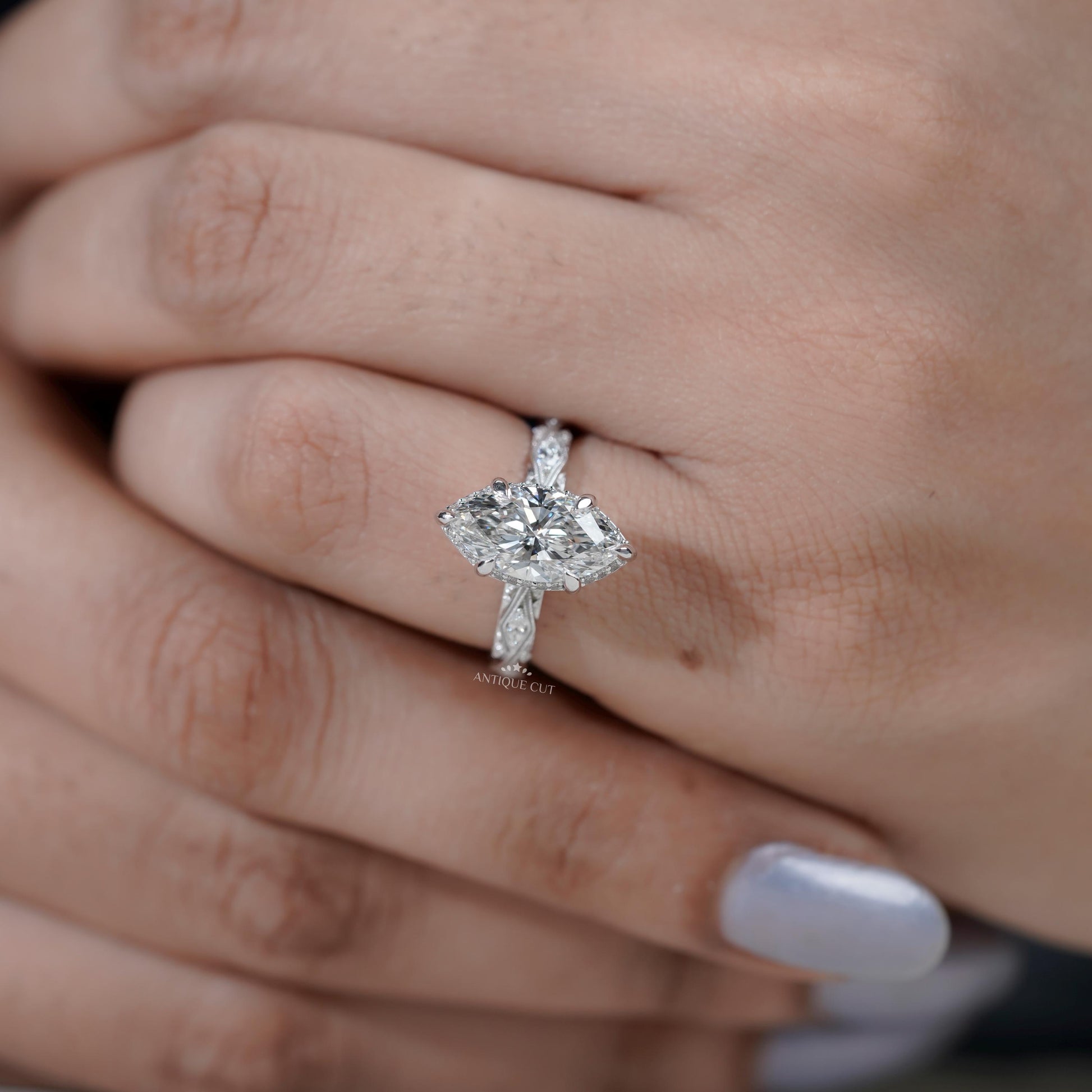 White gold solitaire marquise diamond ring design