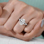 Hand-set pave diamonds on white gold oval engagement ring