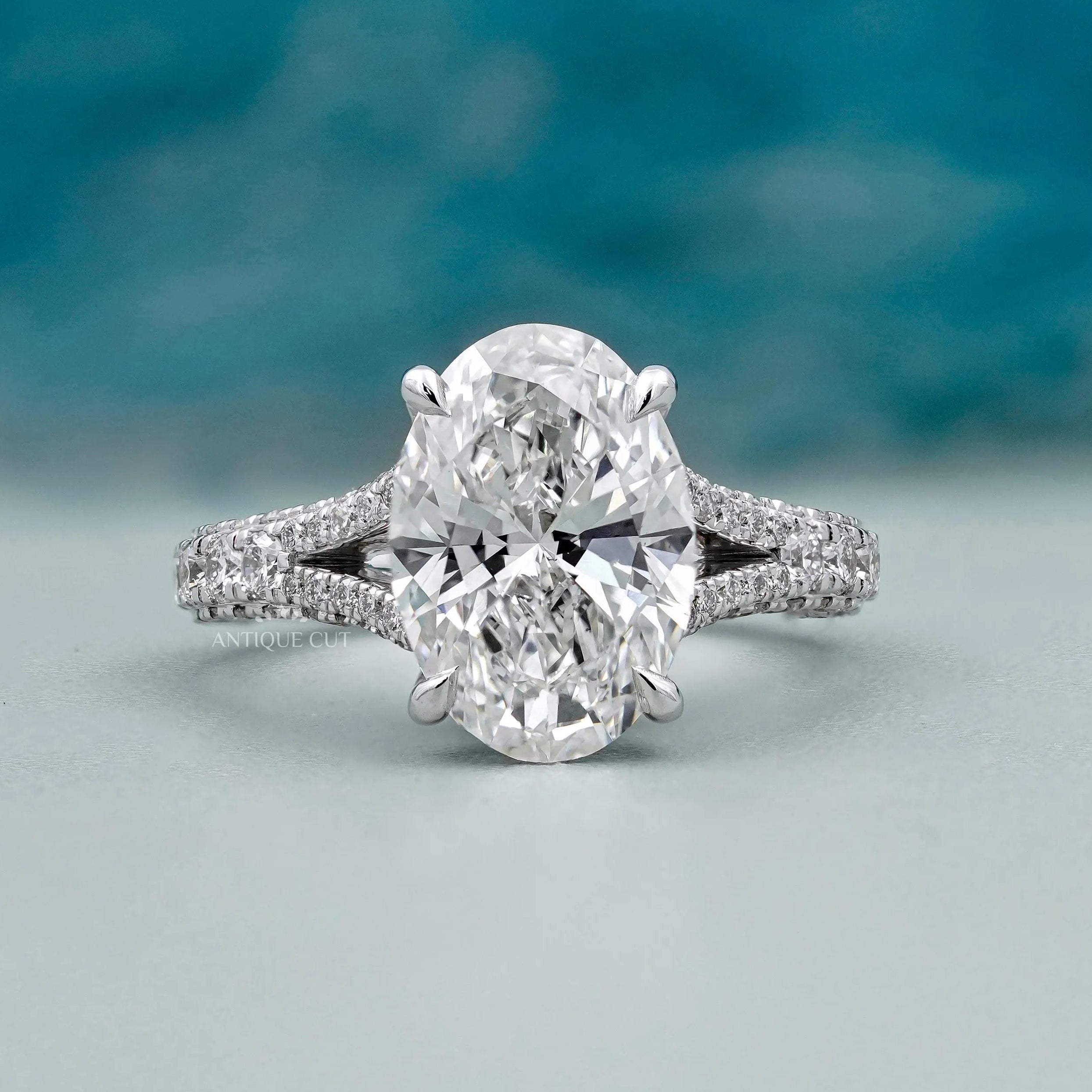 Oval Cut Engagement Ring with pave diamond band in white gold