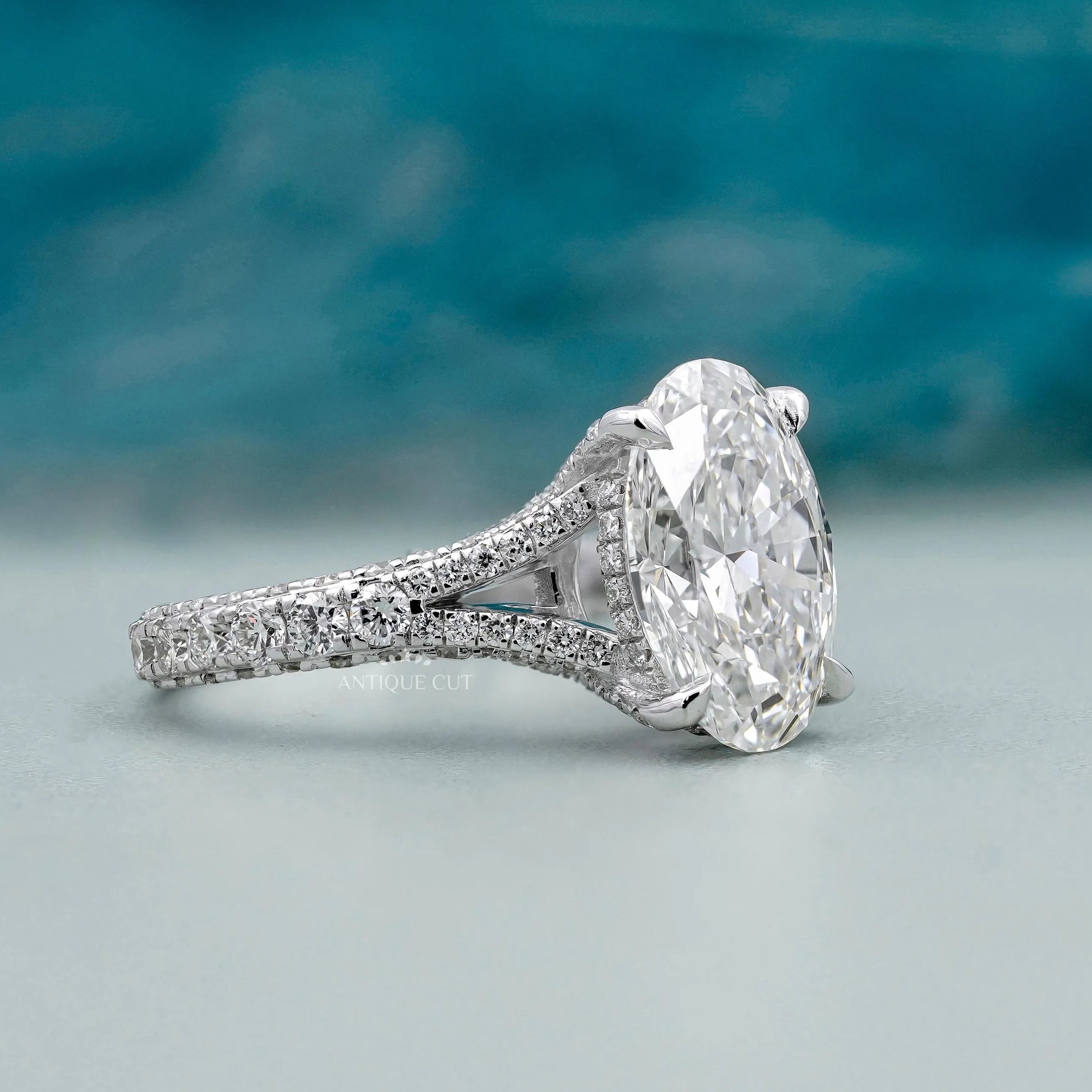 White gold oval engagement ring with split shank design