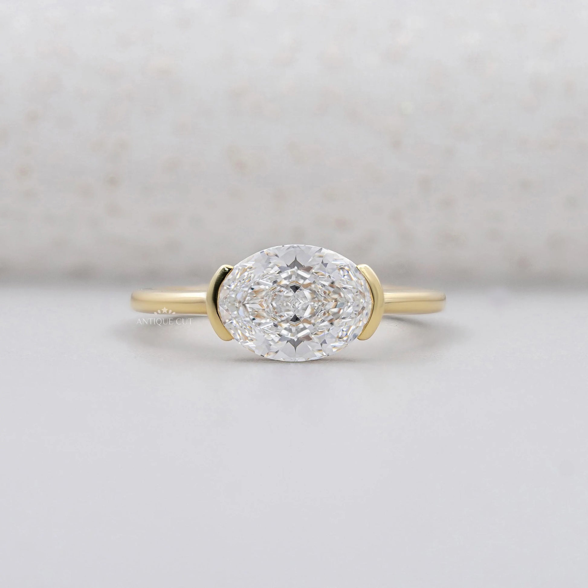 East West Engagement Ring With Oval diamond | Half Bezel Set Ring |  White gold