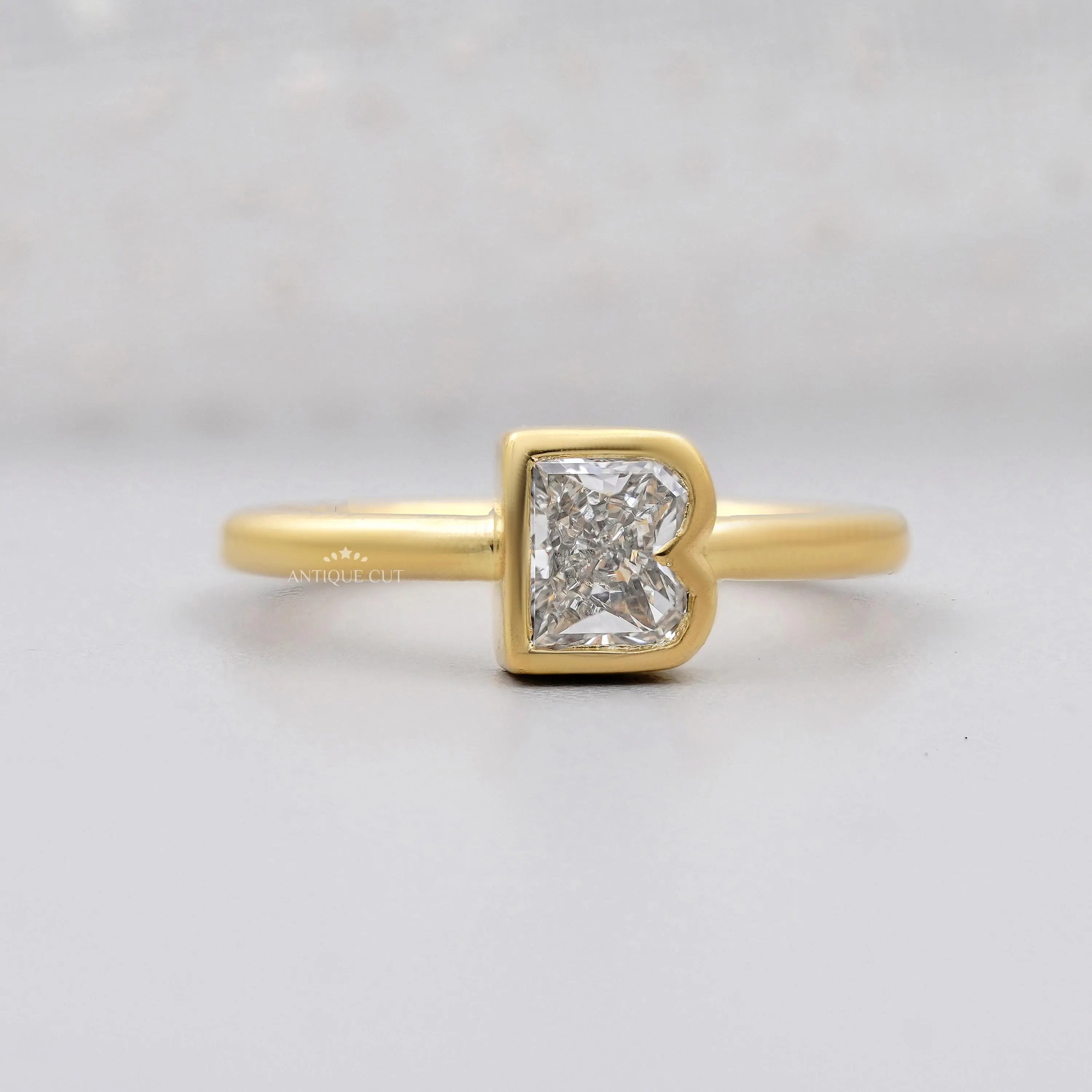 Yellow gold letter B diamond engagement ring