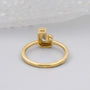 Bezel set J initial diamond ring close-up