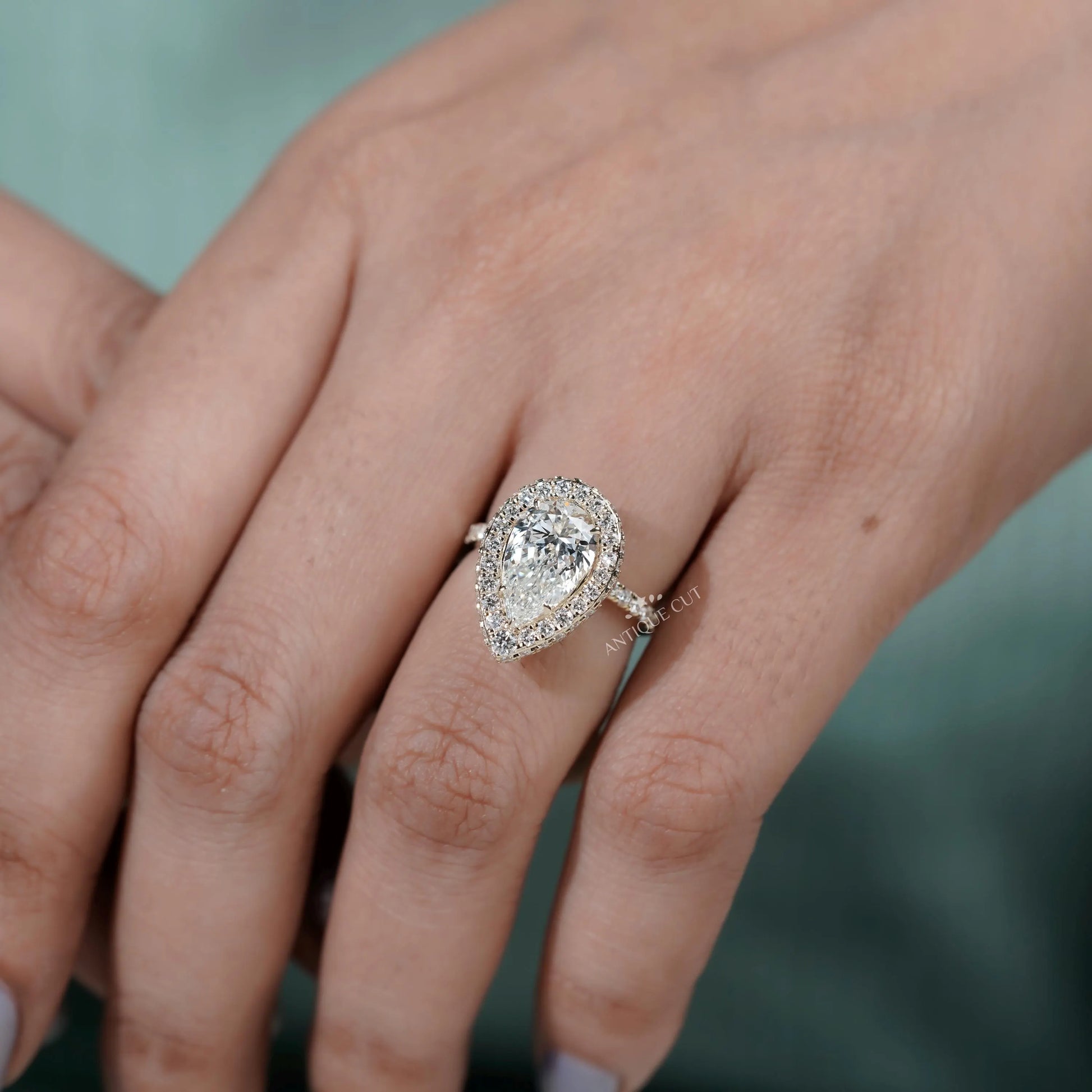 Luxury pear shape halo diamond ring