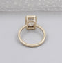 Solitaire diamond accent on emerald ring