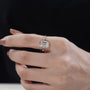Luxury emerald engagement ring side view