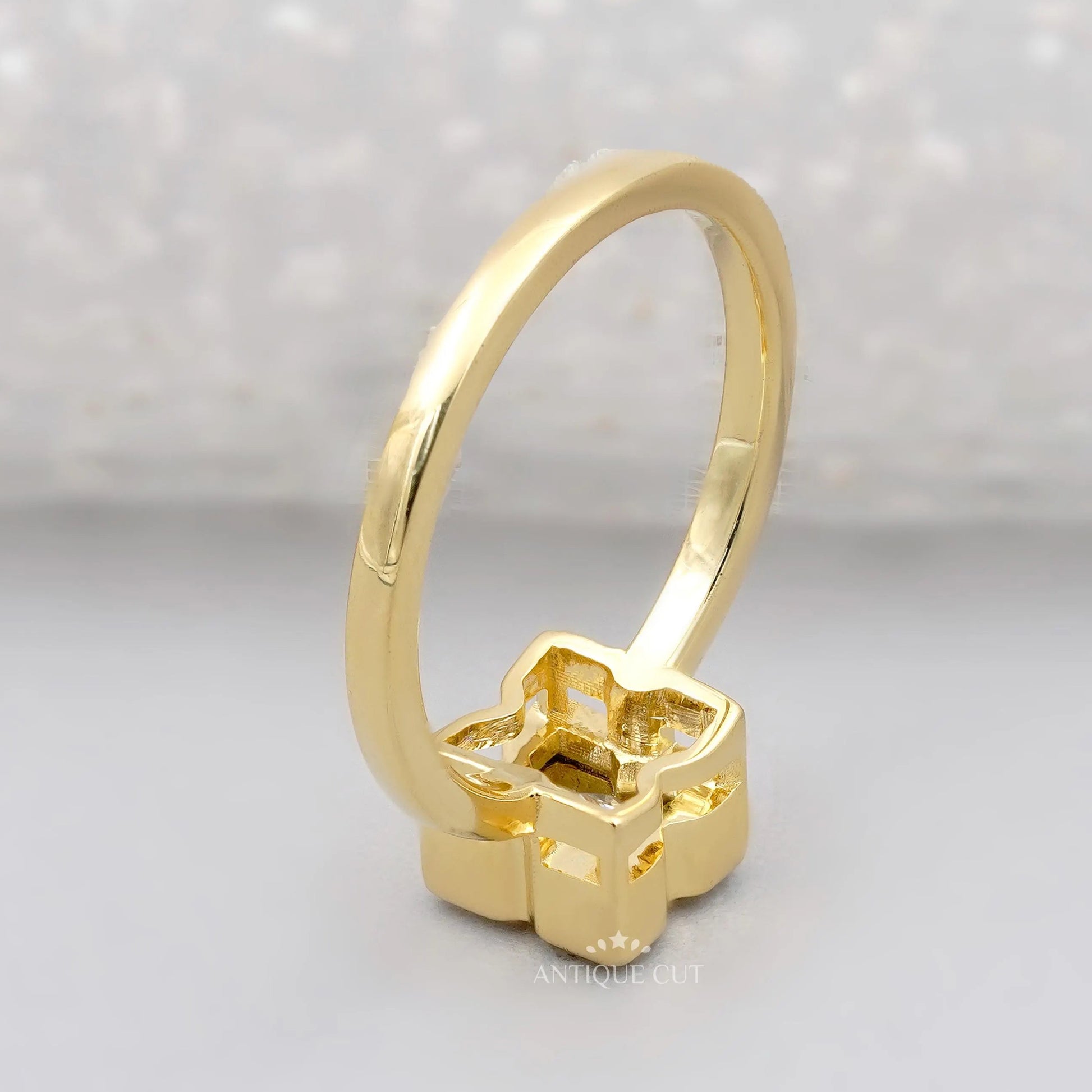 Yellow Gold X Letter Ring with bezel set diamonds