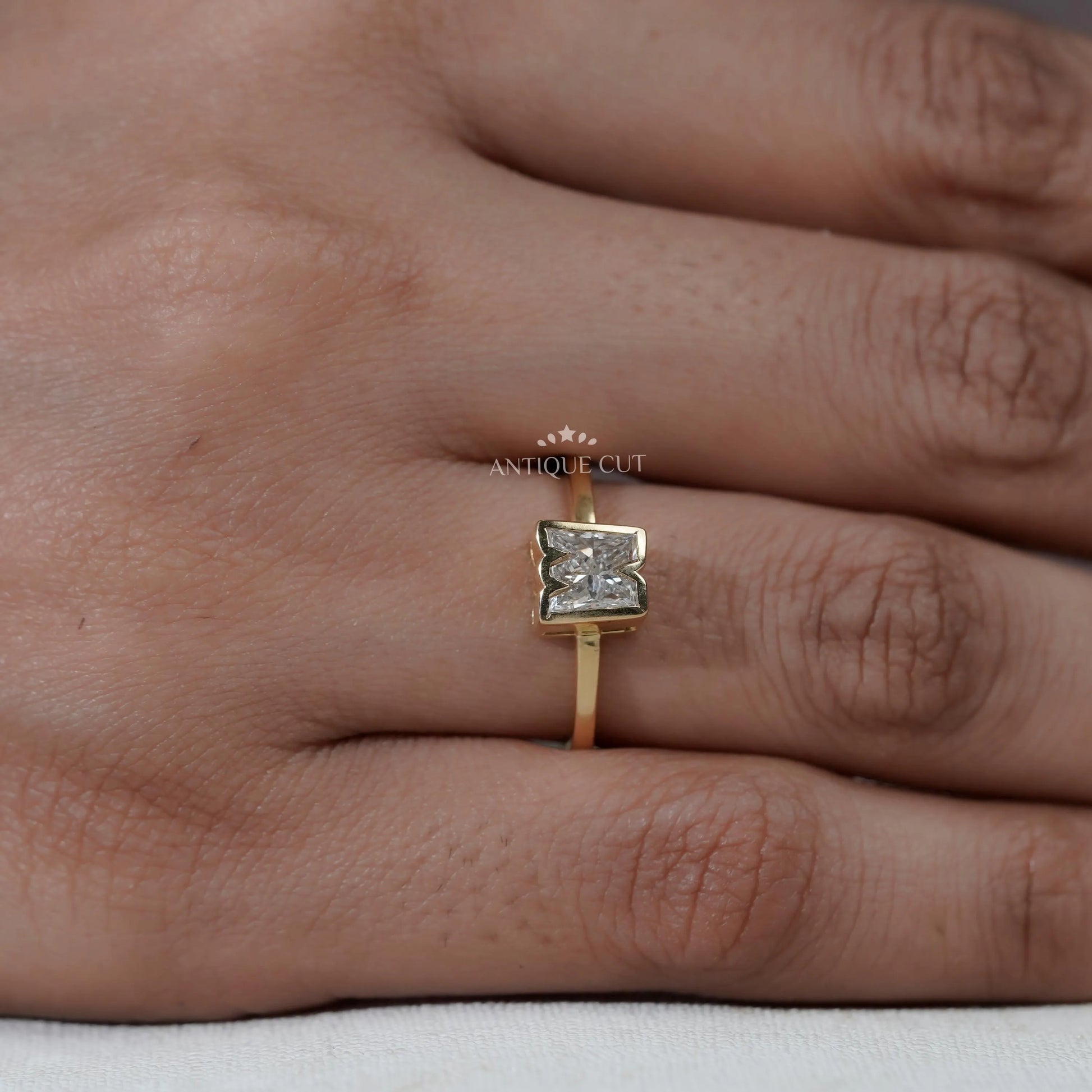 Elegant M shape diamond ring front view