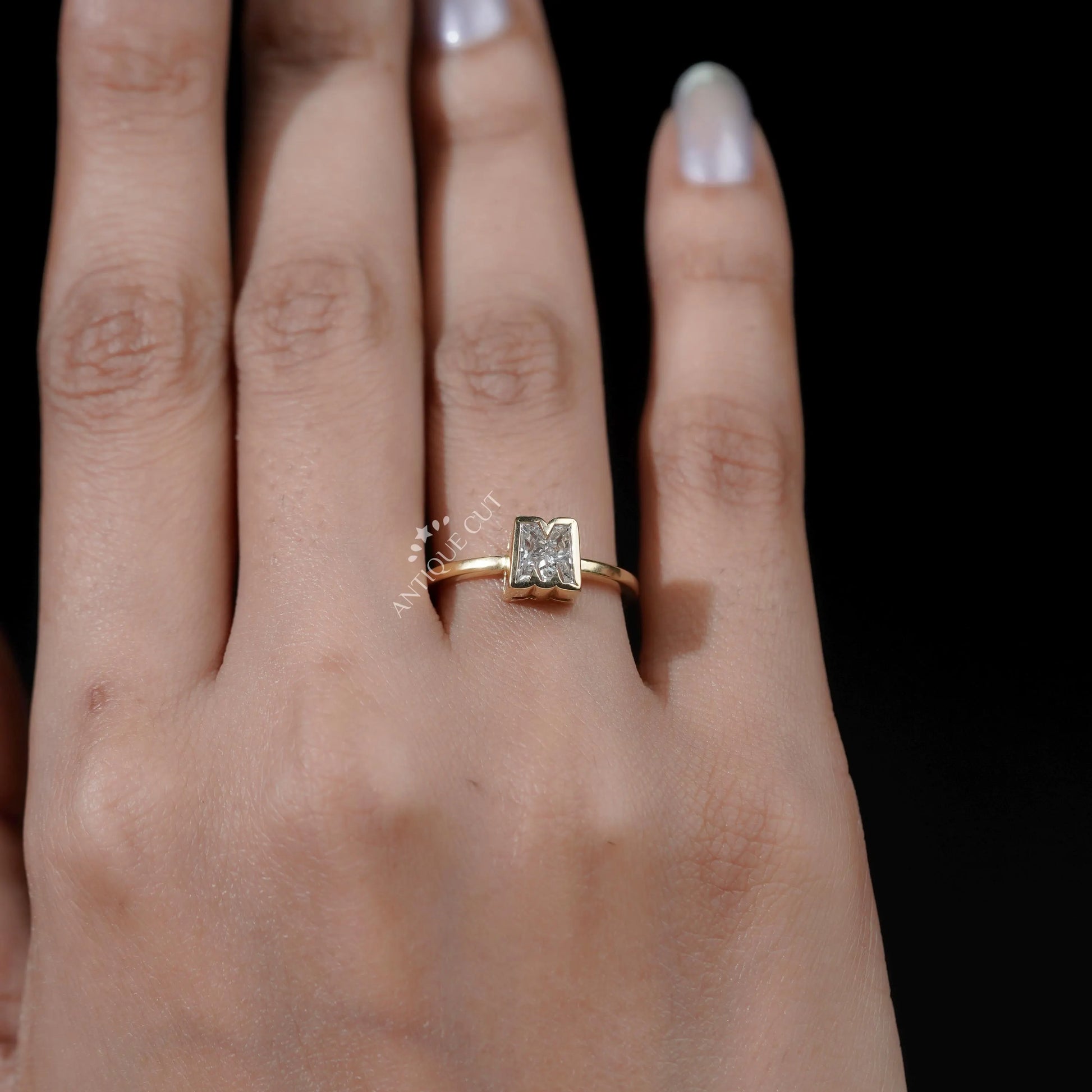M letter diamond ring side view