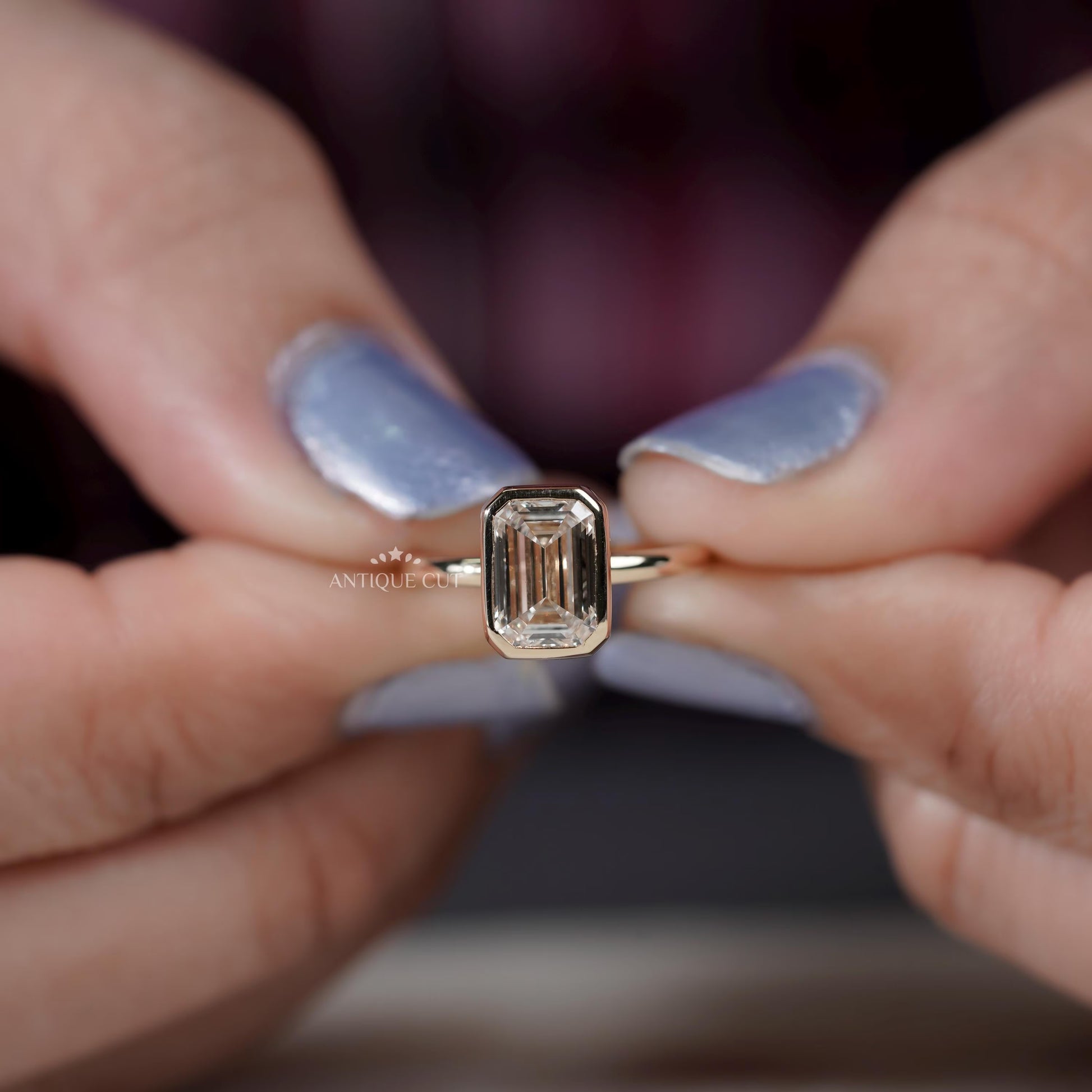 Elegant emerald cut diamond ring front view
