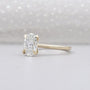 Yellow gold oval engagement ring side view halo