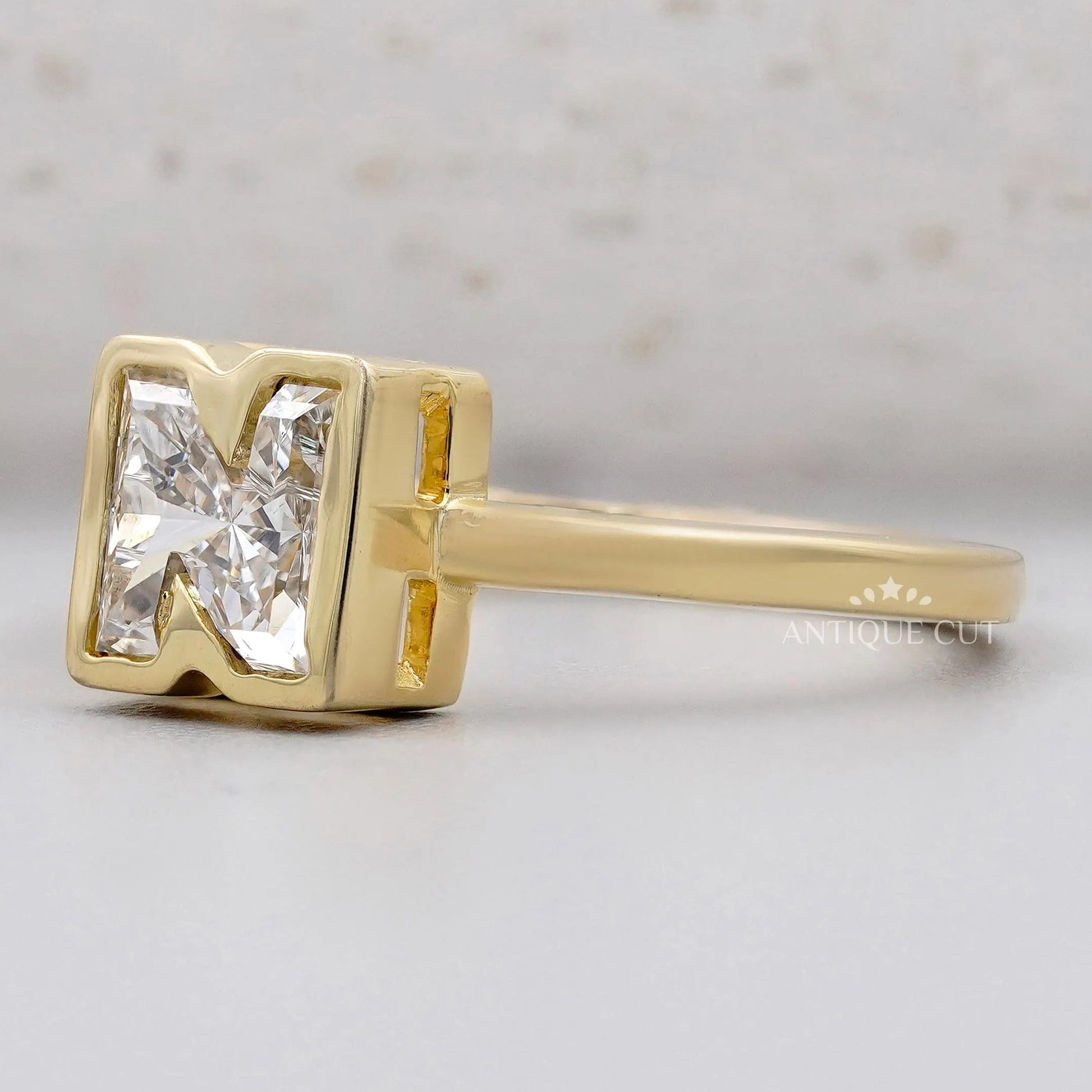 Antique cut N letter diamond ring yellow gold